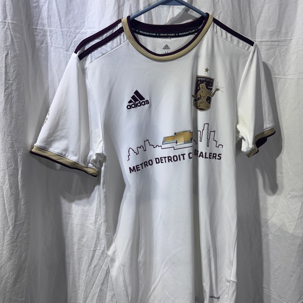 White Adidas Soccer Jersey with Gold Accents